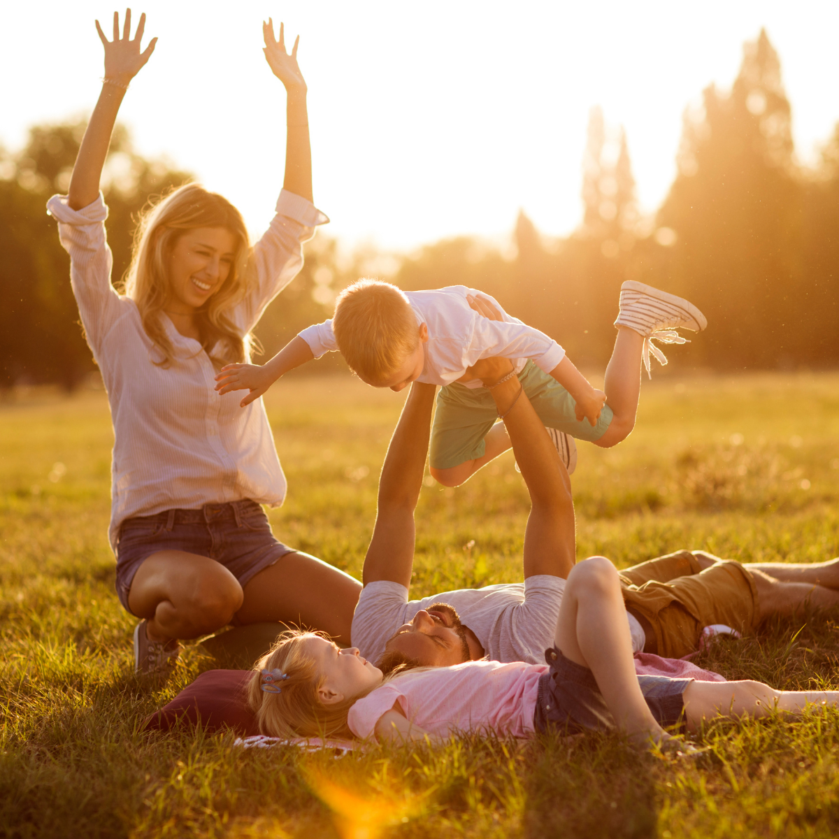 family led in a field happy